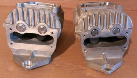 This shows the two variations of the Jaguar Eaton M112 Supercharger. The model on the left has protruding needle bearings that extend out past the sealing surface of the supercharger inlet port. The Jaguar Eaton M112 on the right has sub-flush needle bearings that are below the sealing surface of the supercharger in order to provide clearance where the inlet bolts on. These two superchargers are not interchangable because the protruding bearings will prevent proper installation of the Jaguar inlet plenum. The needle bearings are different diameters with the protruding needle bearings being a much larger diameter. The sub-flush needle bearings replacement is  included in the Jaguar Eaton Complete Supercharger Rebuild Service.